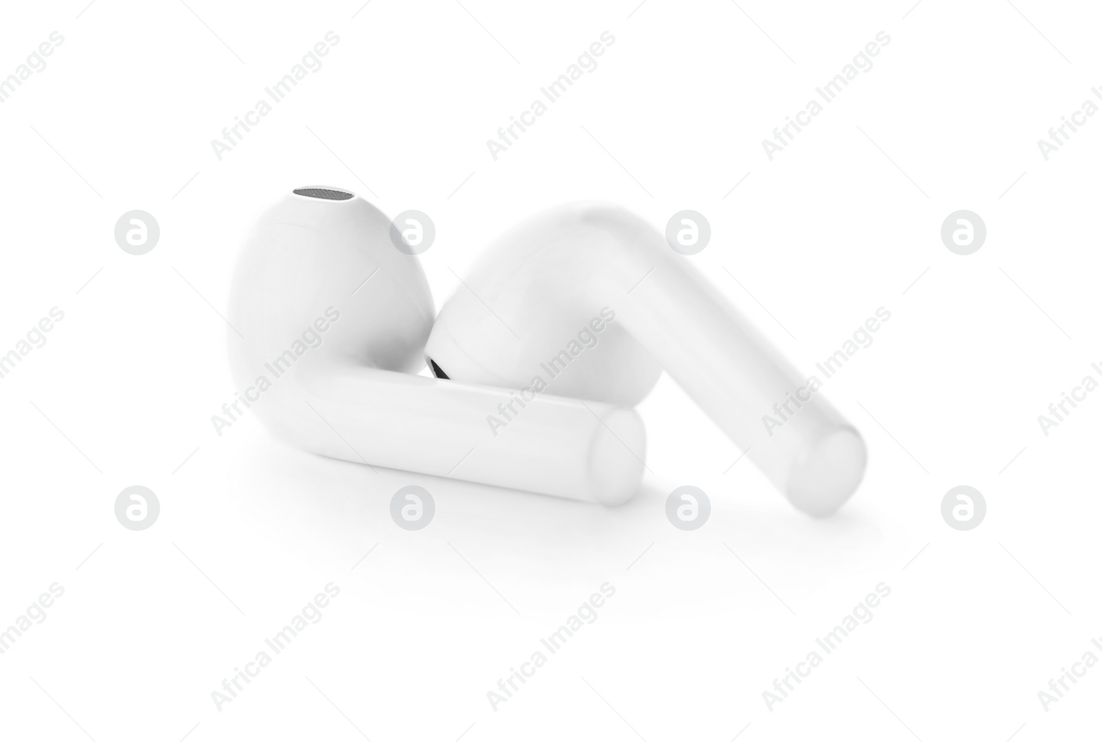 Photo of Pair of modern wireless earphones on white background