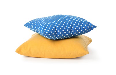 Different colorful decorative pillows on white background