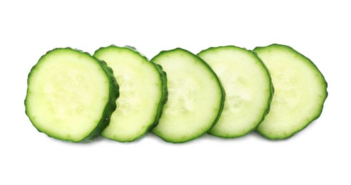 Photo of Slices of fresh ripe cucumber isolated on white