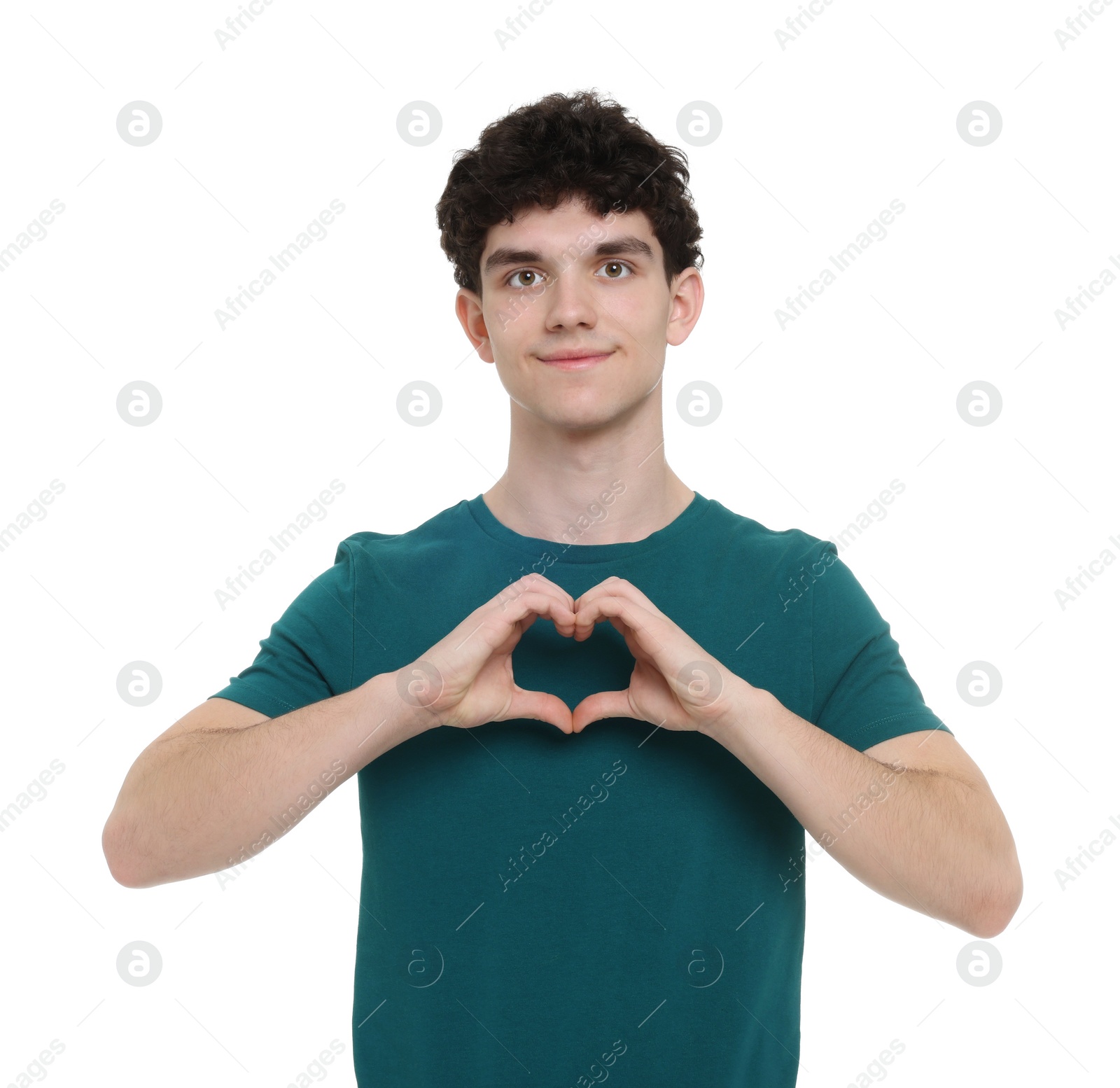 Photo of Happy young man showing heart gesture with hands on white background