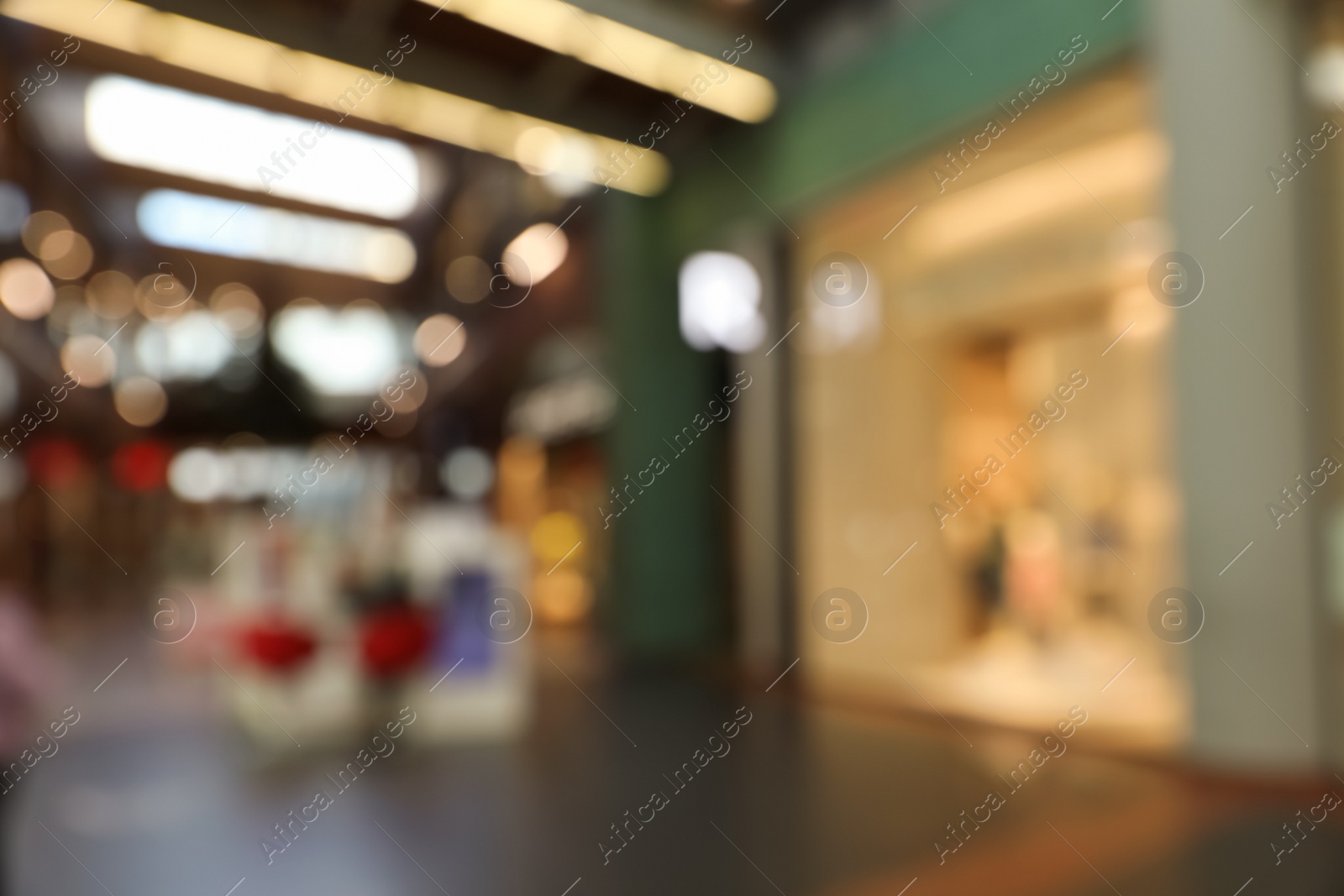 Photo of Blurred view of shopping mall interior. Bokeh effect