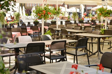 Cafe with outdoor terrace, plants and beautiful furniture