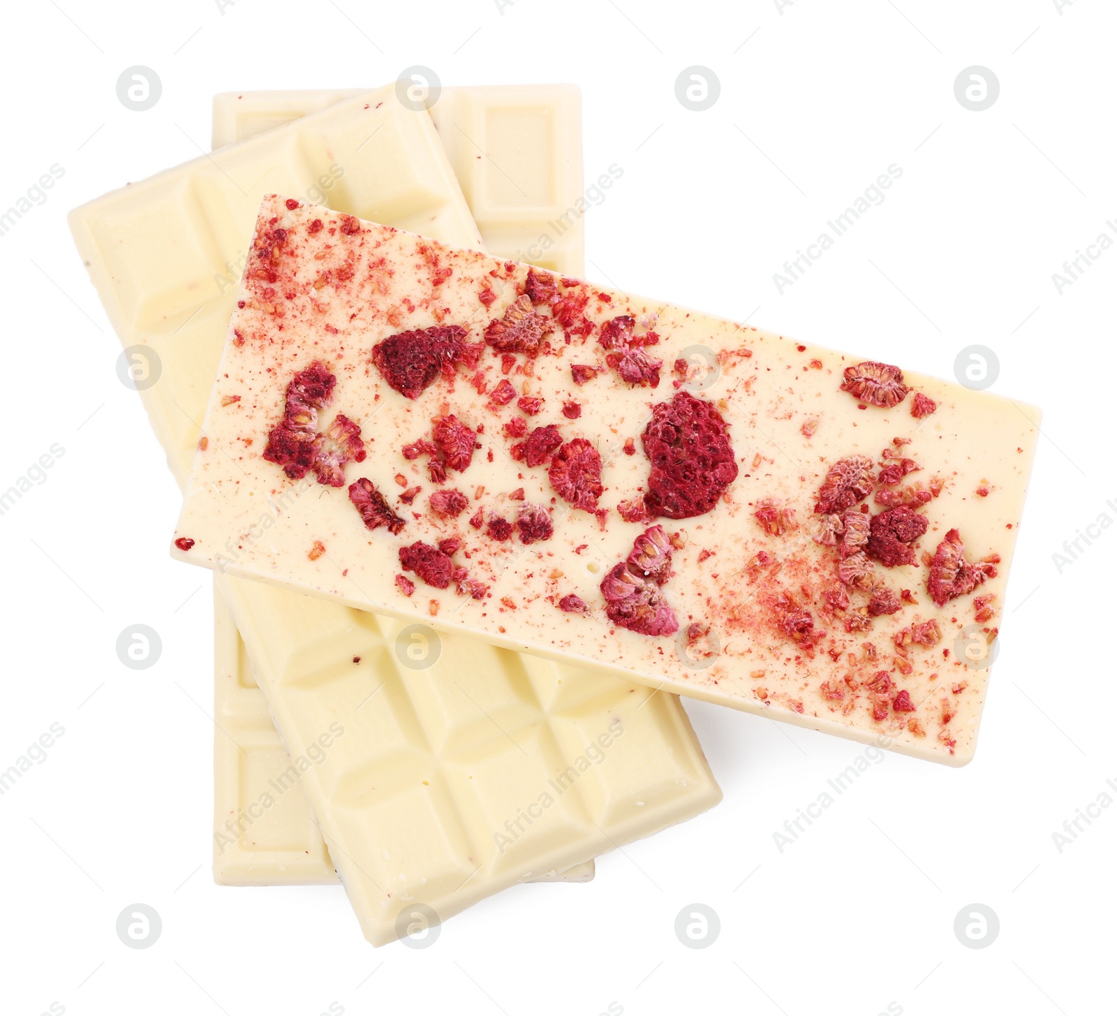 Photo of Chocolate bars with freeze dried raspberries on white background, top view