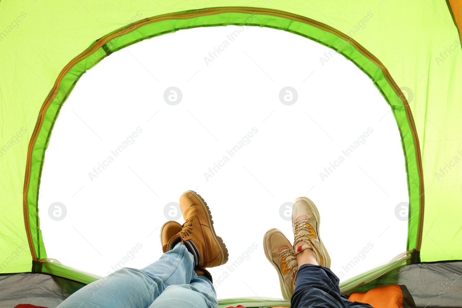 Photo of Closeup of couple in camping tent on white background, view from inside