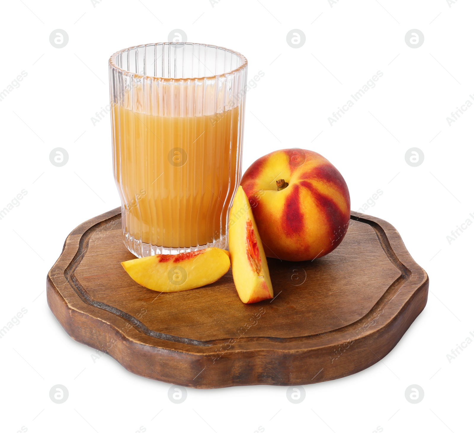 Photo of Glass of delicious juice, whole and cut peaches isolated on white
