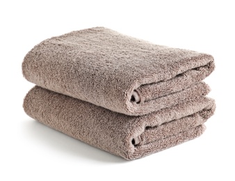 Photo of Fresh soft folded towels isolated on white