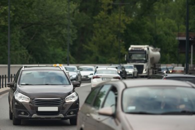 Photo of View of highway with road traffic on summer day