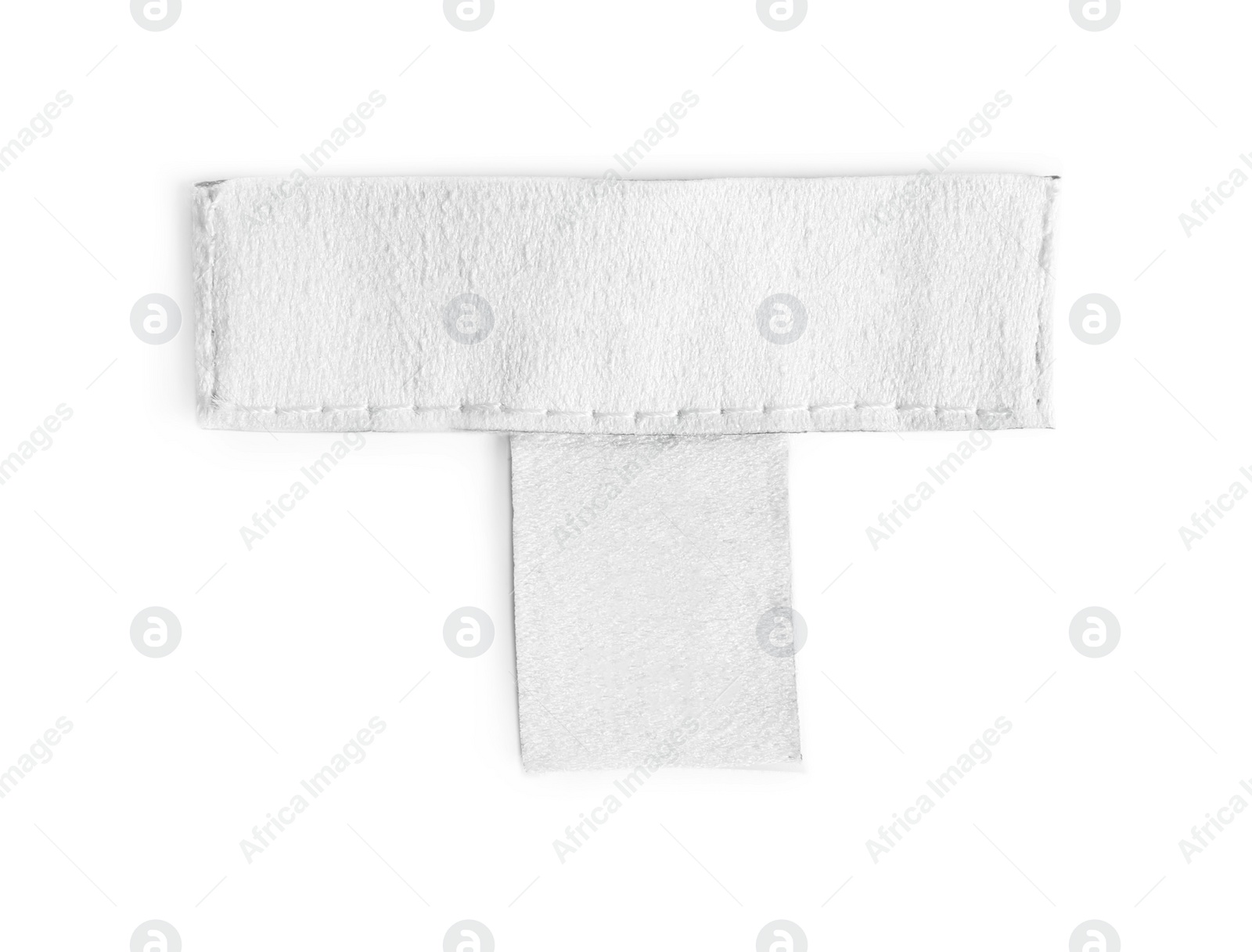 Photo of Blank clothing label isolated on white, top view