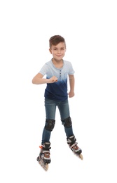 Little boy with inline roller skates on white background