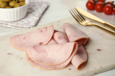Slices of tasty ham on table, closeup