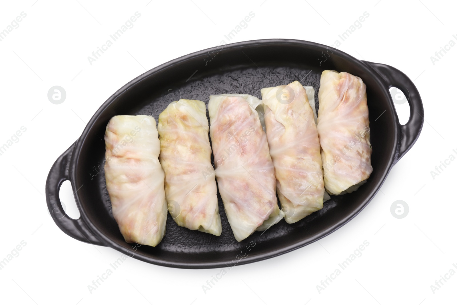 Photo of Uncooked stuffed cabbage rolls isolated on white, top view