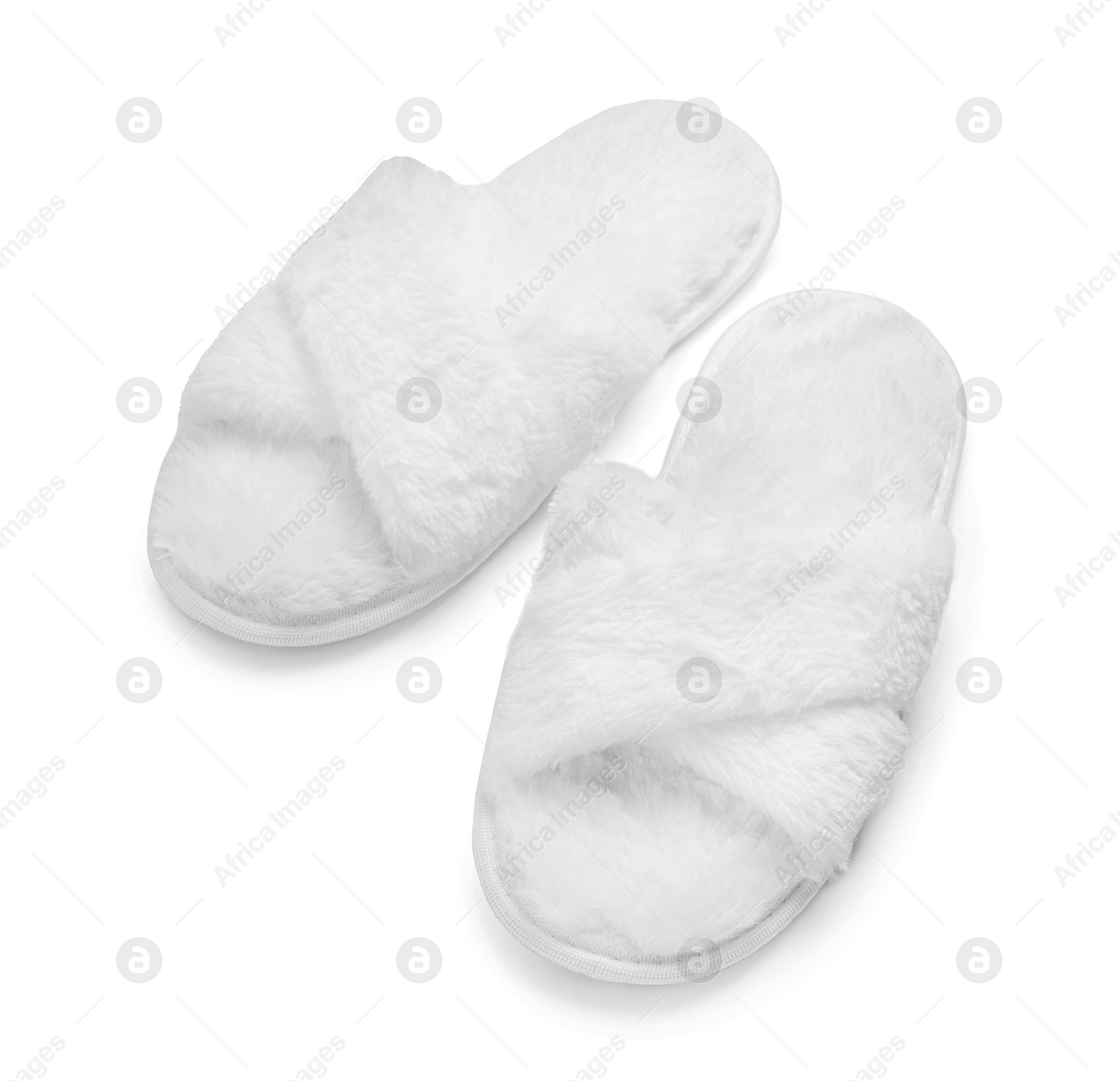 Photo of Pair of soft slippers isolated on white