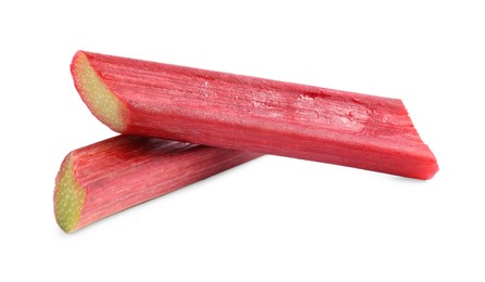 Photo of Stalks of fresh ripe rhubarb isolated on white