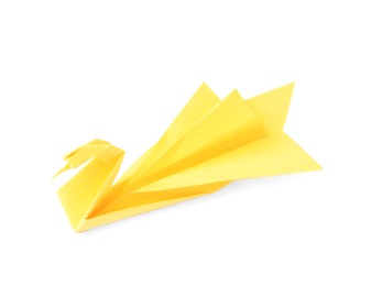 Photo of Yellow paper swan isolated on white. Origami art