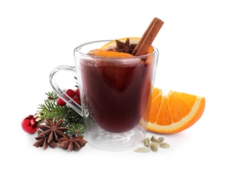 Photo of Aromatic mulled wine and ingredients on white background