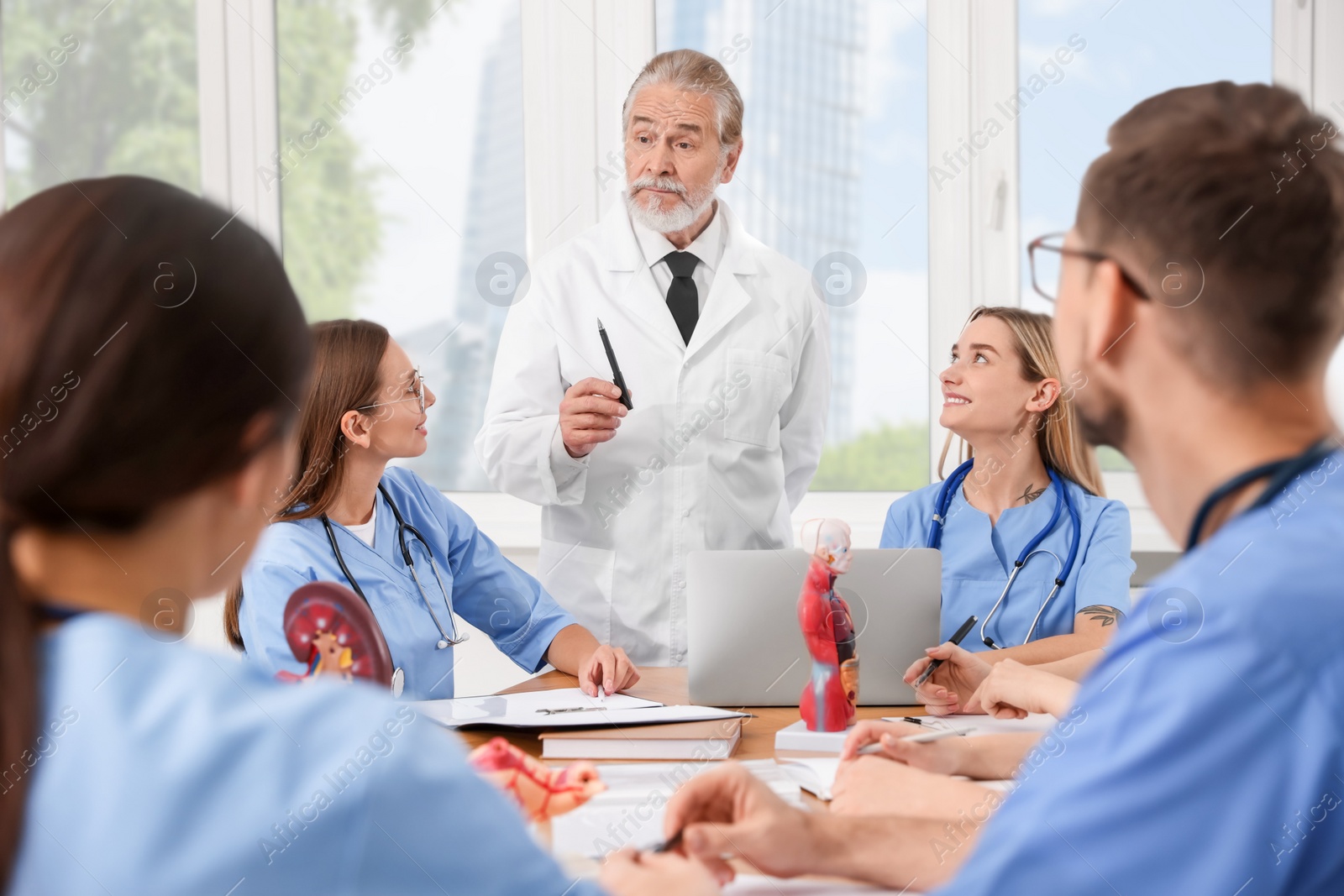 Photo of Doctor giving lecture for interns in university