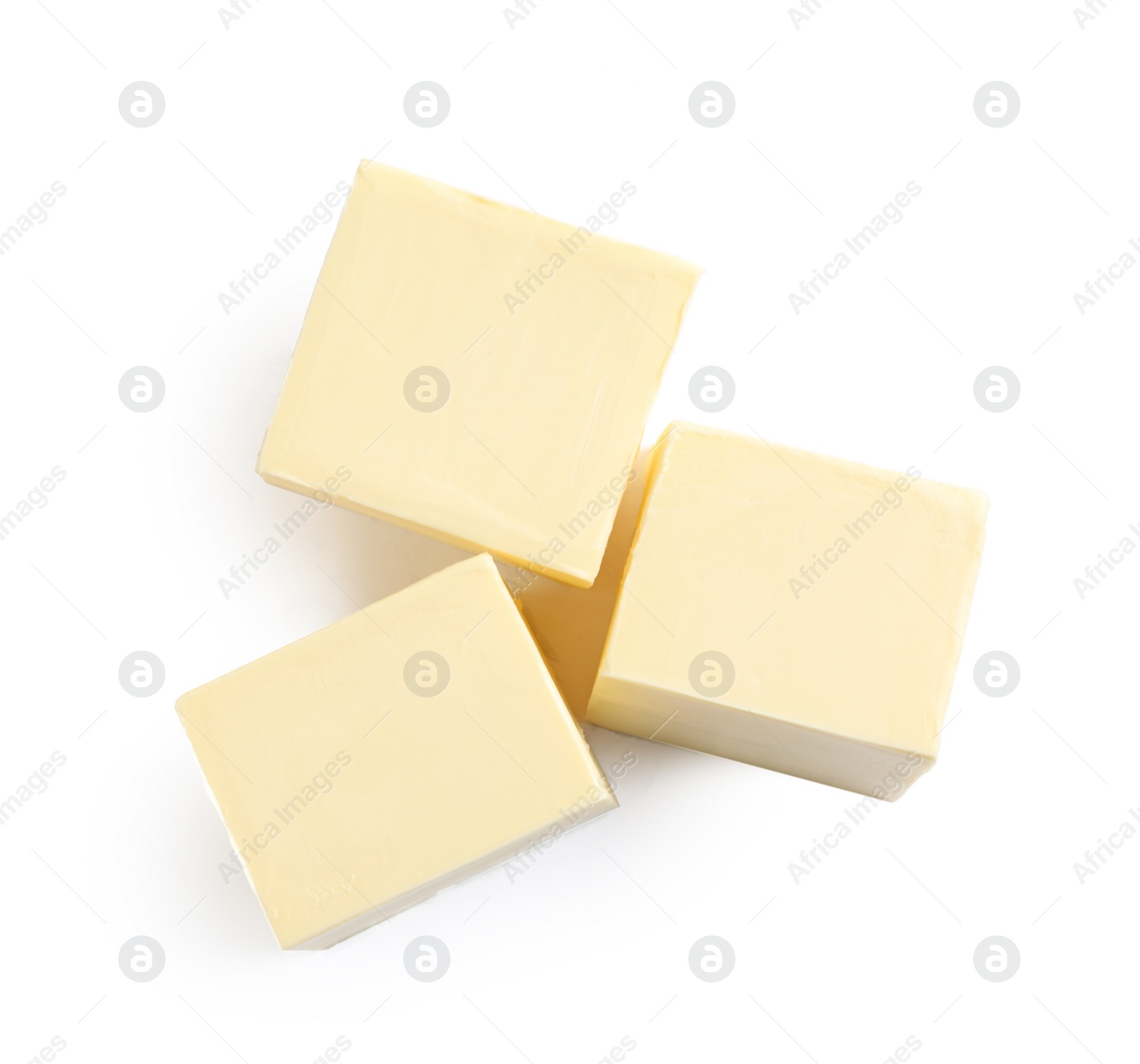 Photo of Cut butter on white background, top view