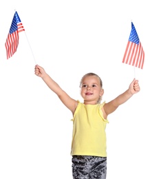 Photo of Little girl with American flags on white background