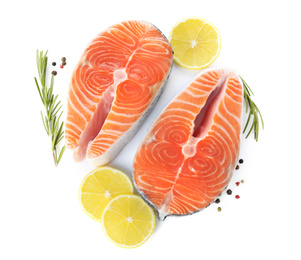 Photo of Fresh raw salmon with lemon, pepper and rosemary on white background, top view. Fish delicacy