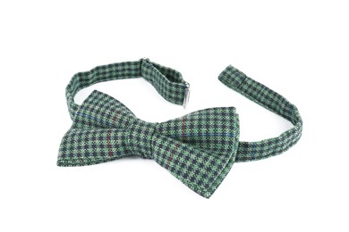 Photo of Stylish checkered bow tie isolated on white