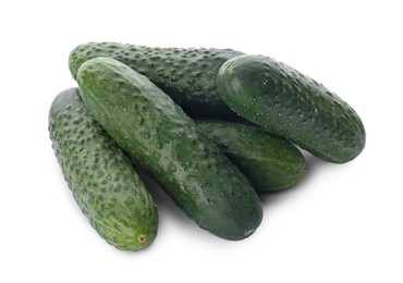 Photo of Whole fresh green cucumbers on white background