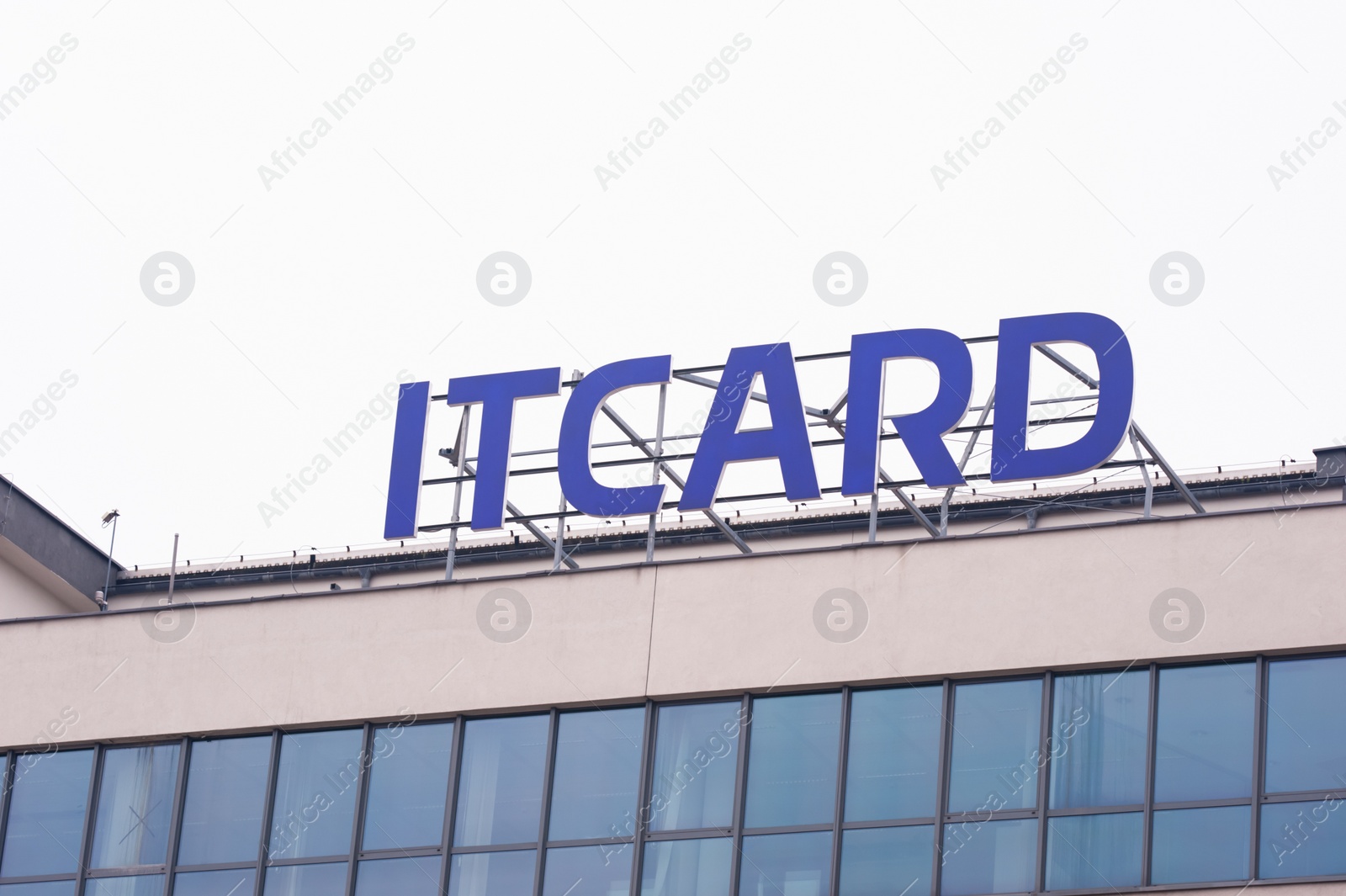 Photo of Warsaw, Poland - September 10, 2022: Building with modern Itcard logo