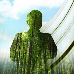 Image of Double exposure of man and green trees in city