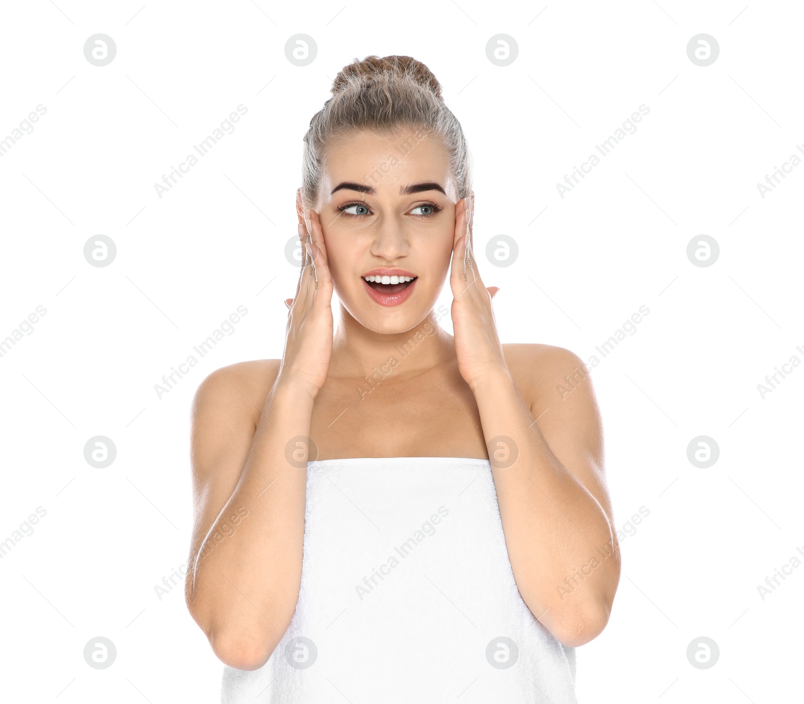 Photo of Portrait of young pretty woman with towel on white background