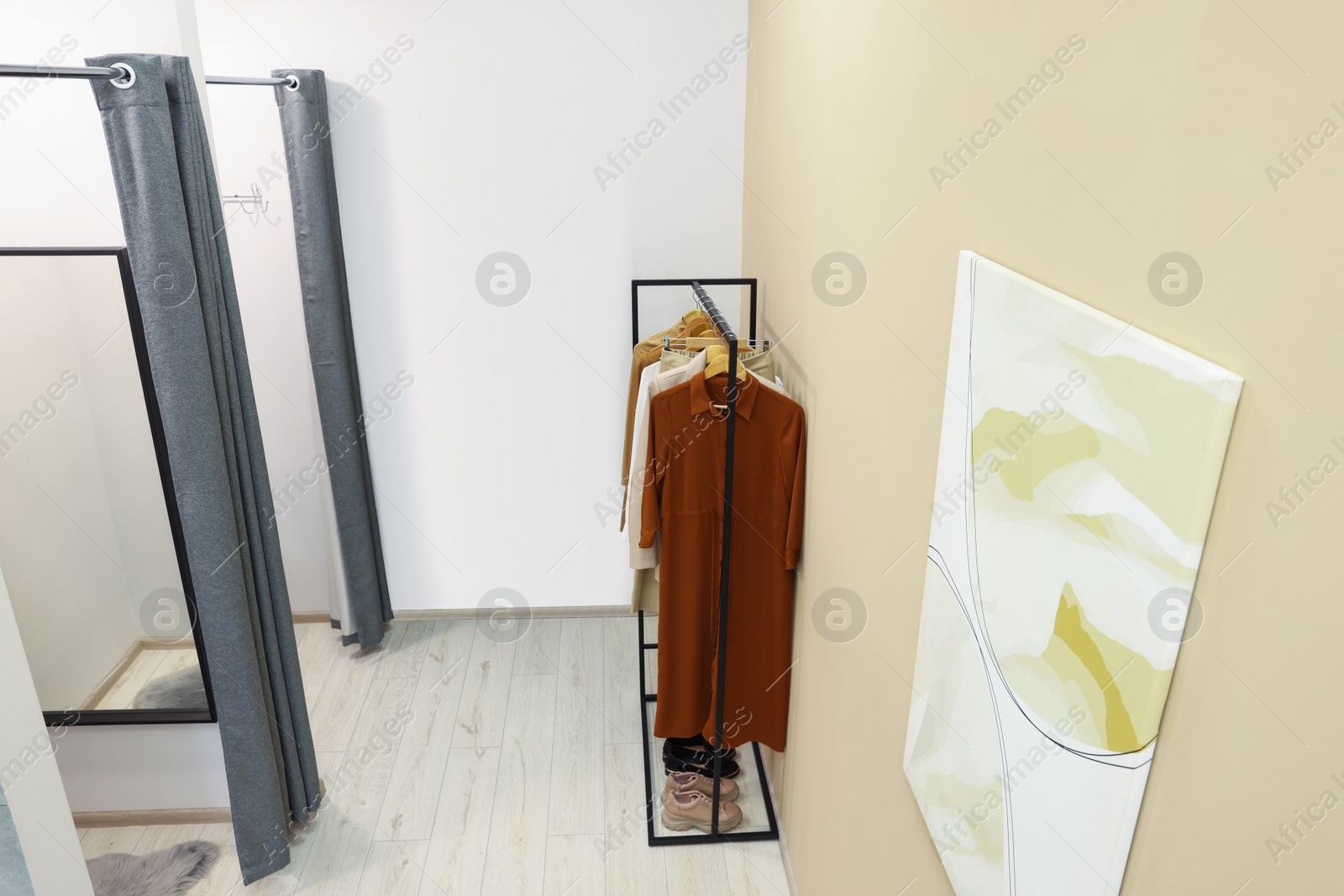 Photo of Dressing rooms in fashion store. Interior design