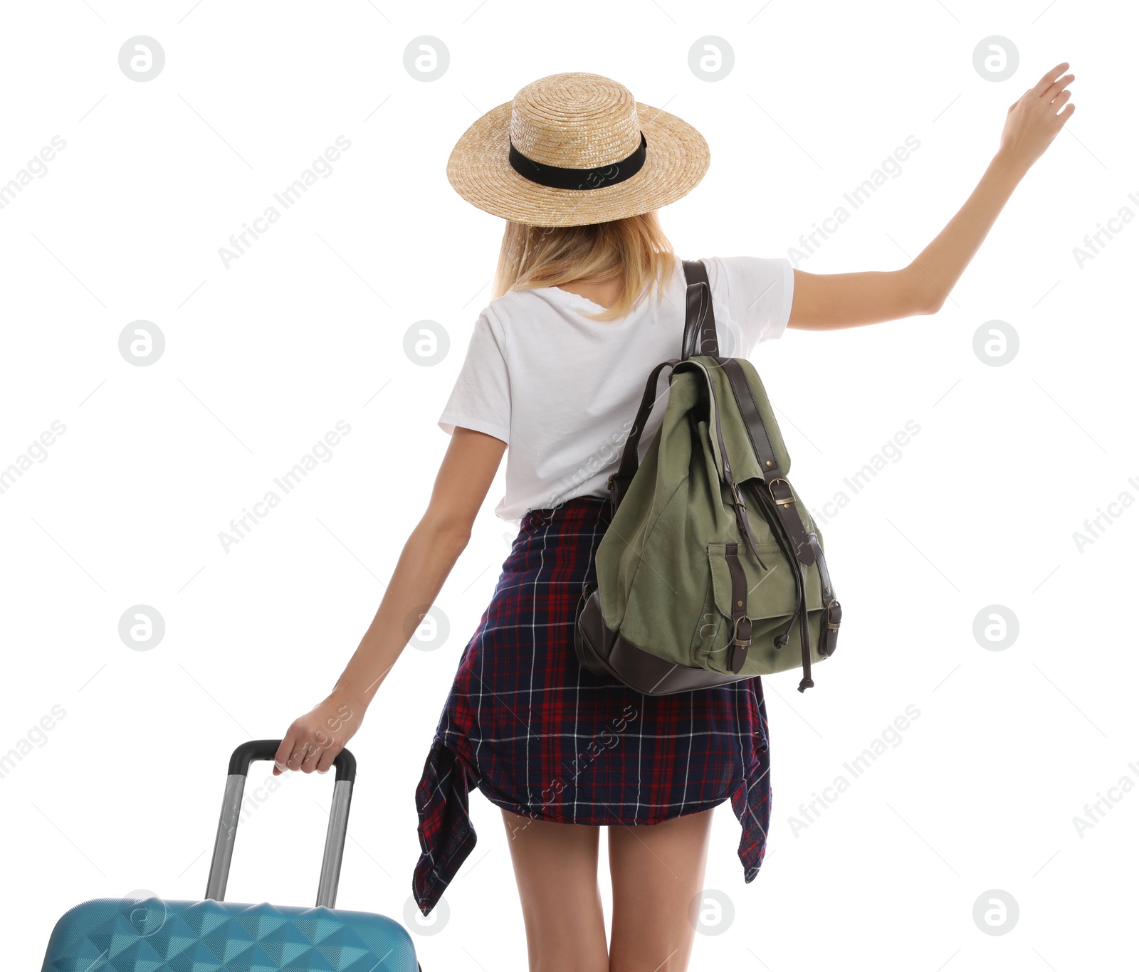 Photo of Woman with suitcase walking on white background, back view. Summer travel