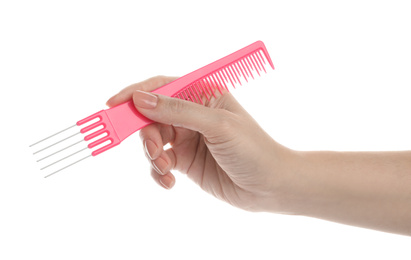Photo of Woman holding pin tail comb on white background, closeup