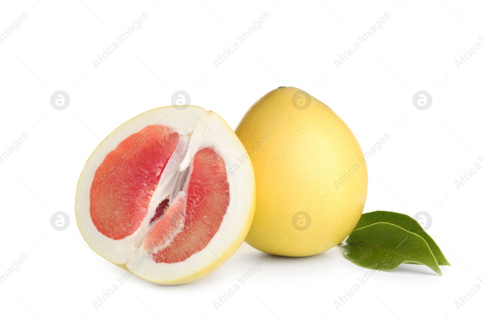 Photo of Fresh cut and whole pomelo fruits isolated on white