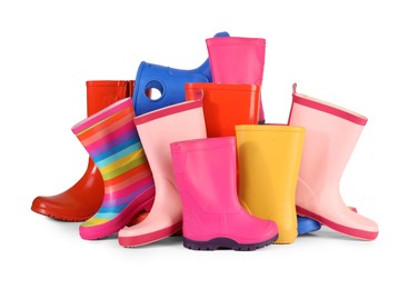 Photo of Pile of different female gumboots isolated on white