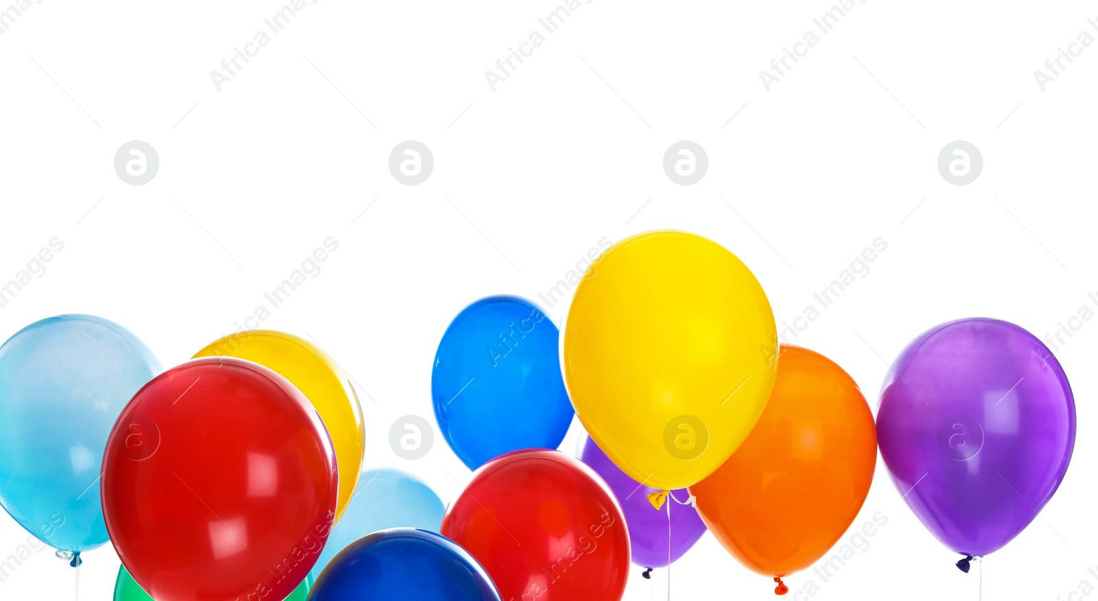 Photo of Colorful balloons on white background. Celebration time