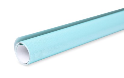 Photo of Roll of turquoise wrapping paper on white background