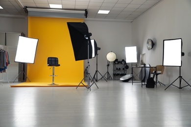 Interior of modern photo studio with professional equipment