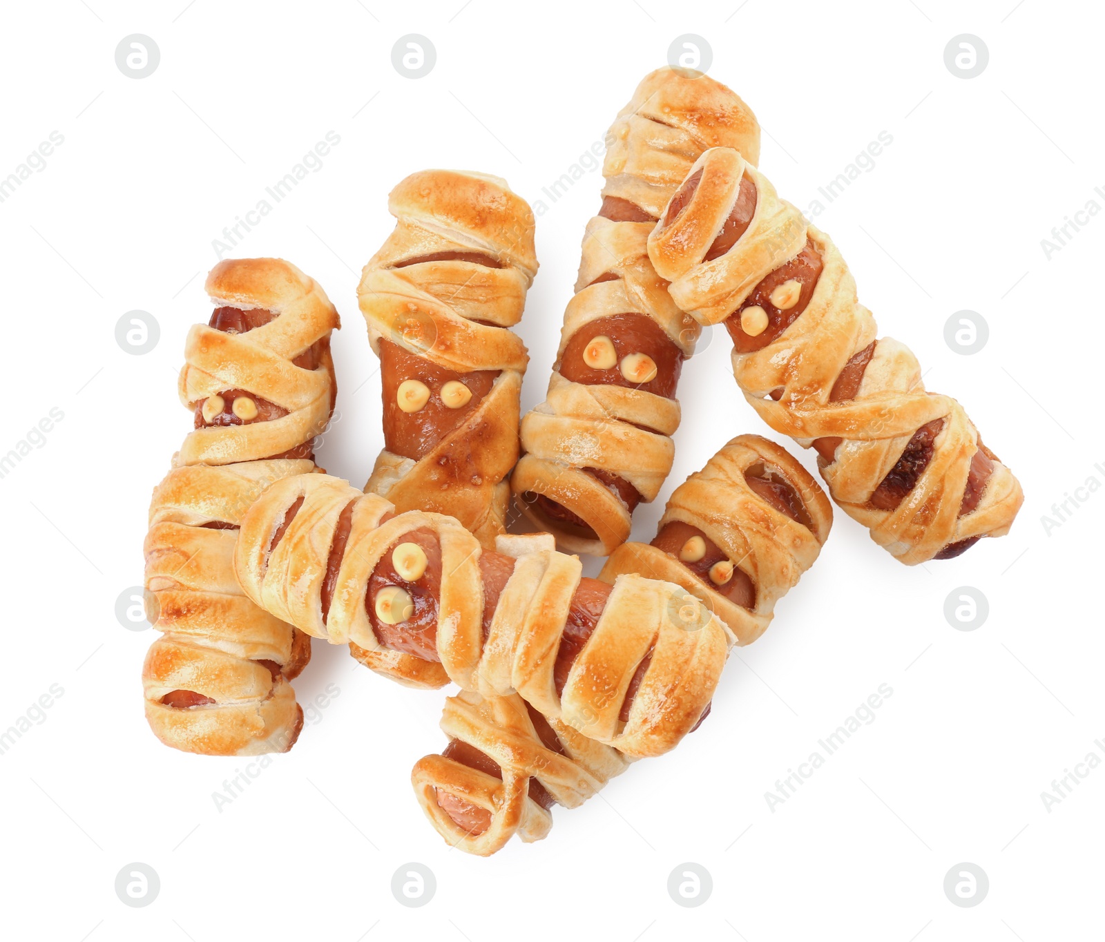 Photo of Cute sausage mummies isolated on white, top view. Halloween party food