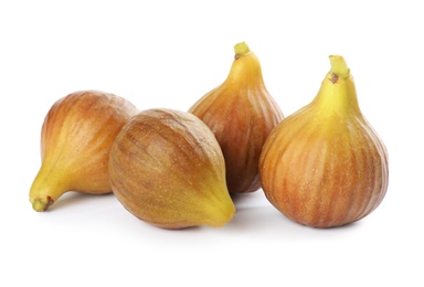 Photo of Whole tasty ripe figs isolated on white