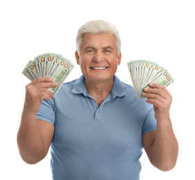 Happy senior man with cash money on white background