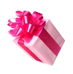 Photo of Gift box with pink bow isolated on white