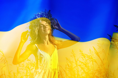 Double exposure of beautiful young woman wearing flower wreath outdoors and Ukrainian flag 