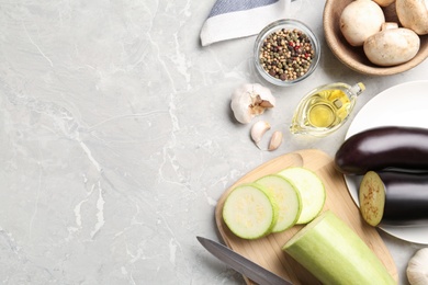 Photo of Fresh vegetables on marble table, flat lay. Space for text