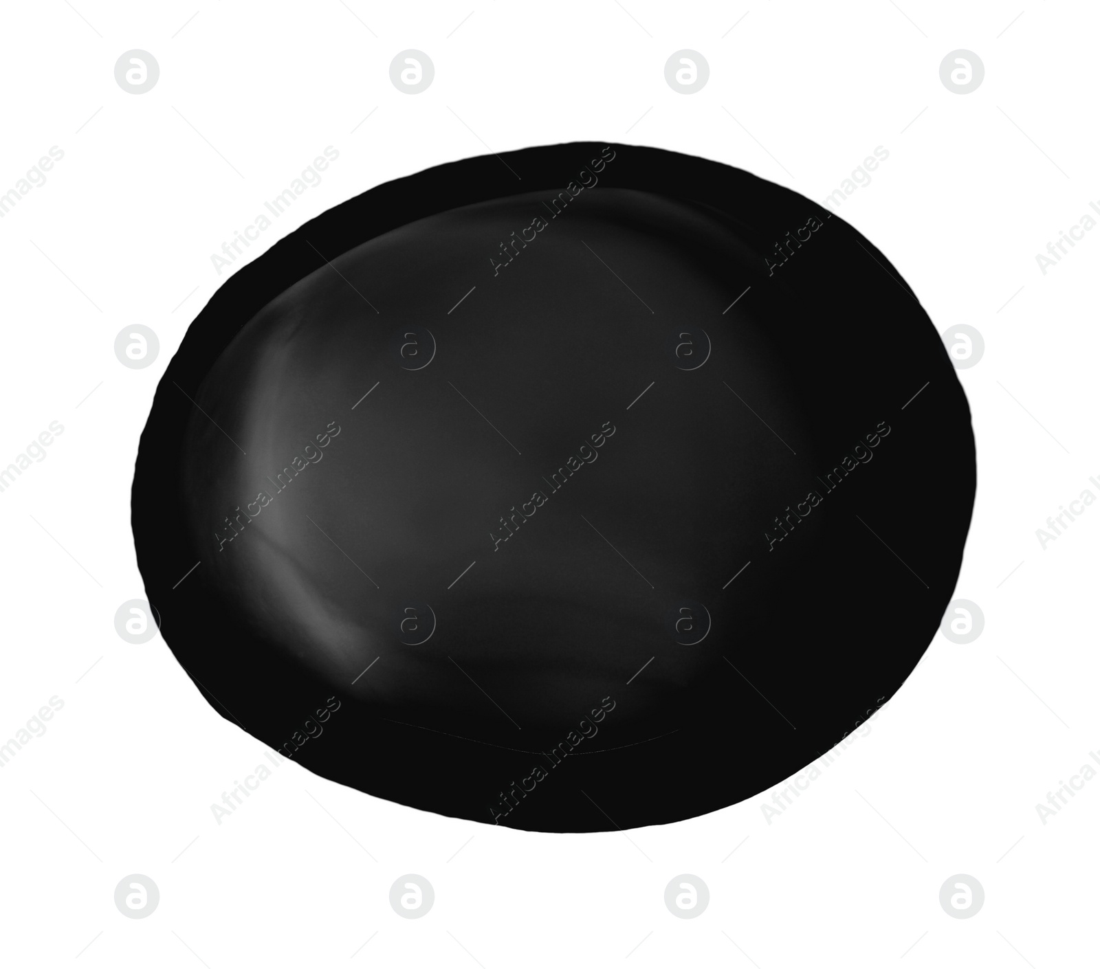 Photo of Black glossy oil blob isolated on white, top view