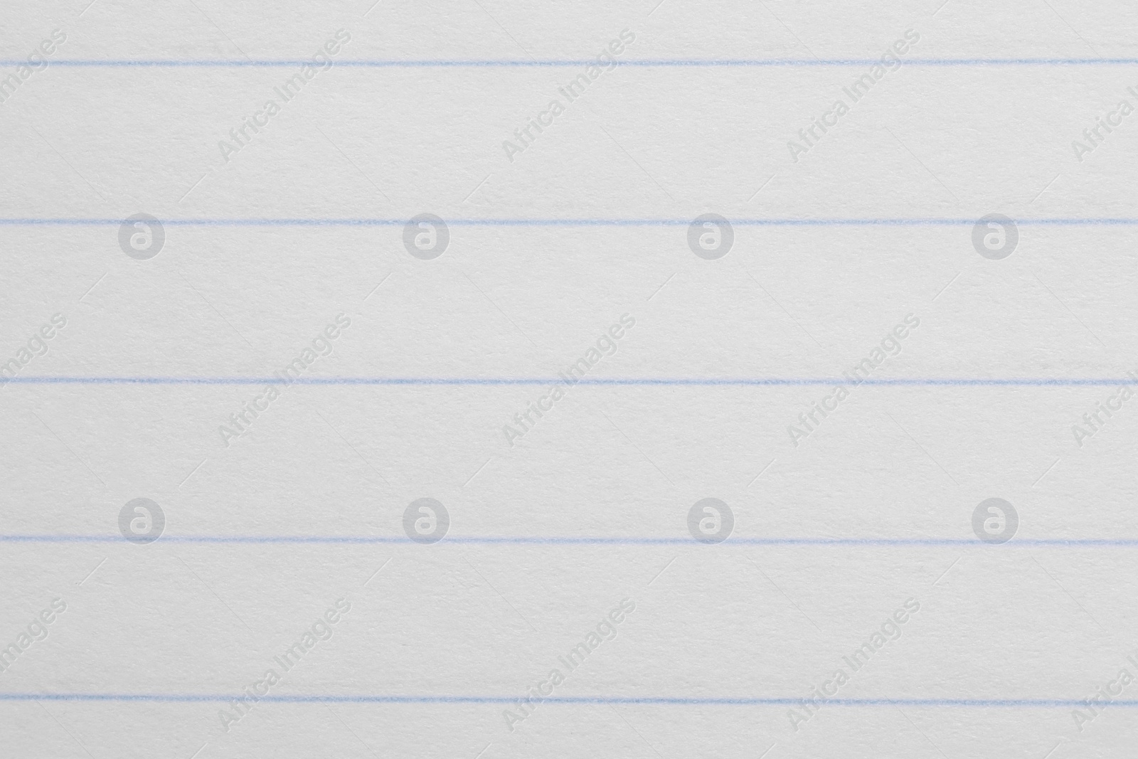 Photo of Texture of copybook paper sheet as background, closeup