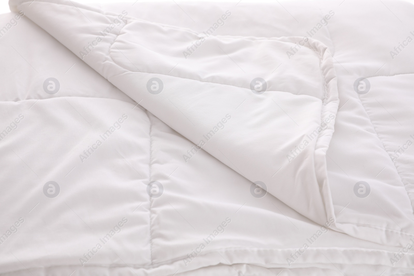 Photo of Clean soft white blanket as background, closeup