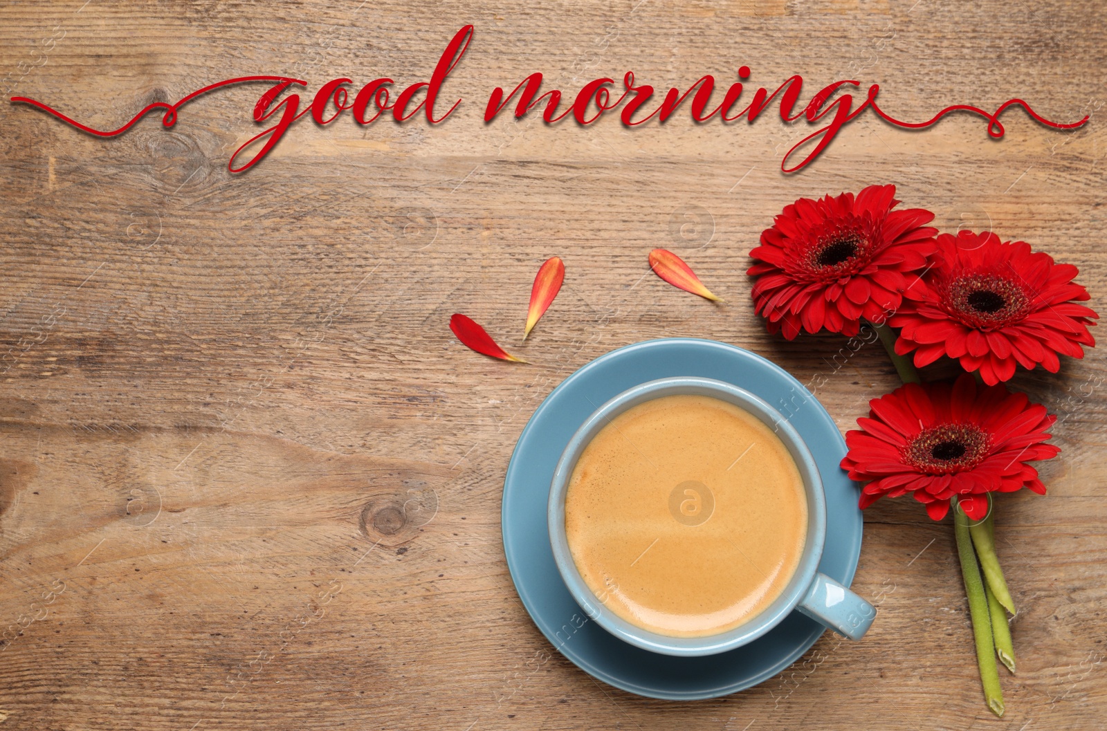 Image of Good morning! Cup of coffee and red gerbera flowers on wooden table, flat lay. Space for text