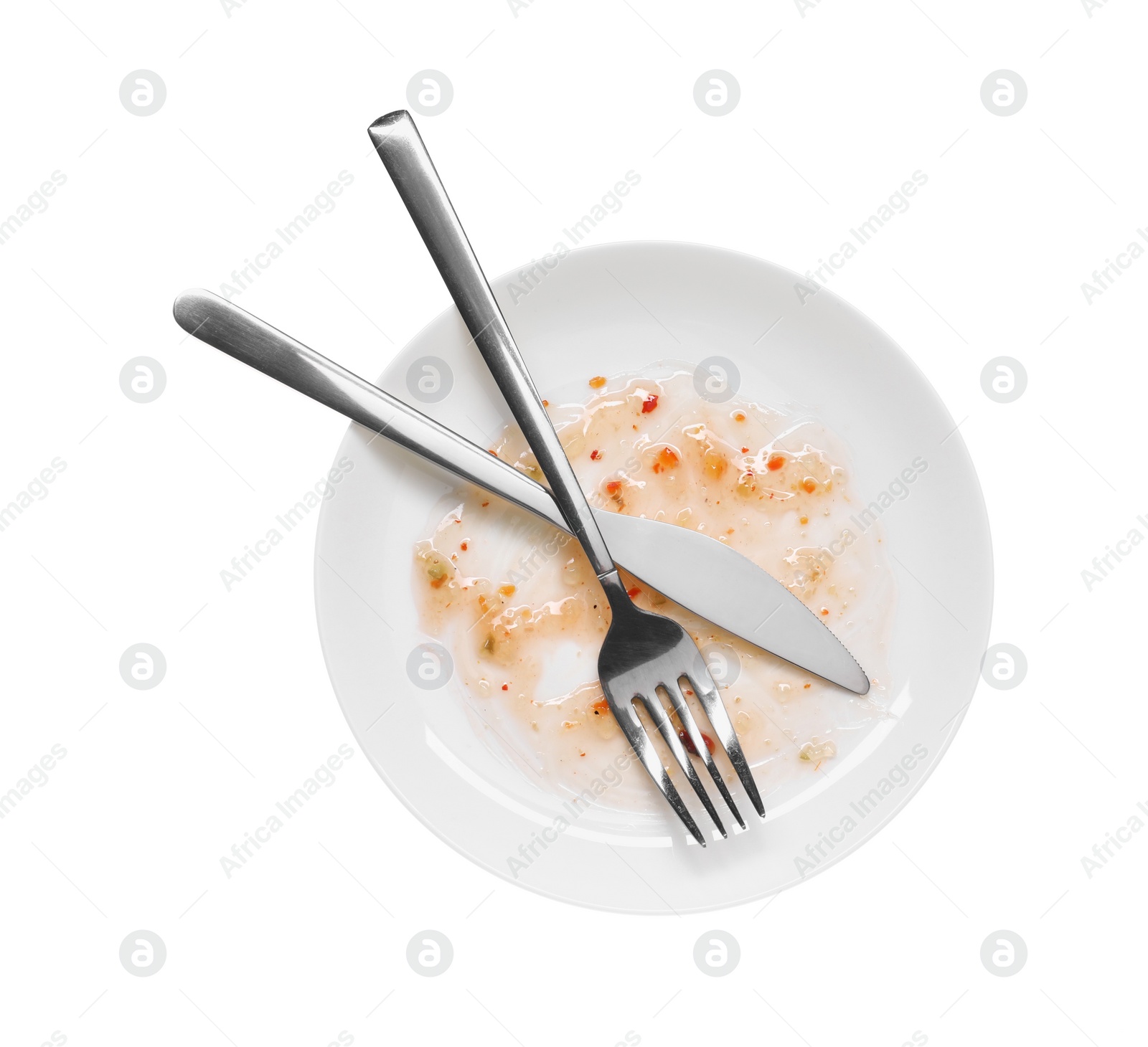 Photo of Dirty plate and cutlery on white background, top view