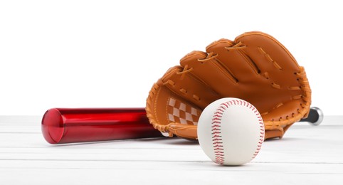 Photo of Baseball bat, ball and catcher's mitt on wooden table against white background