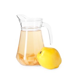 Delicious quince drink in glass jug and fresh fruit isolated on white