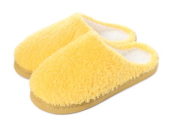 Photo of Pair of yellow soft slippers isolated on white